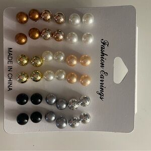 9 pairs of stud earrings